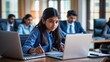 © Arceli - A teenage South Asian girl scheduling conference calls on a shared company calendar