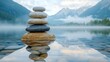 © Agos - Stones balanced on lake, peaceful mountains, serene view