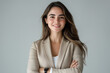 © bitano - Smiling brunette businesswoman in a suit
