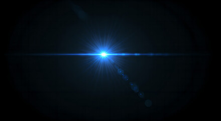 Wall Mural - bright blue lens flare on dark background. glowing light beam effect in night sky. cinematic flash b