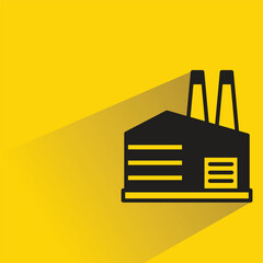 Wall Mural - factory building icon with shadow on yellow background