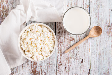 Wall Mural - A bowl of fresh cottage cheese for breakfast on the table top view