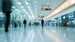 © Andres Mejia - People walking in a blurred modern airport or mall corridor