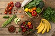 © EnjoyWithWorNa - A variety of fresh fruits and vegetables on a wooden table