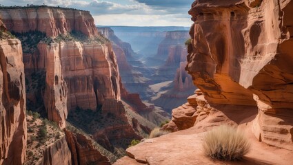Poster - Majestic canyon landscape with layered rock formations and distant vistas under a dramatic sky during golden hour. Scenic nature photography.