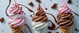 Delicious ice cream cones with chocolate and pink swirls on a white background with chocolate splashes and copy space for desserts.