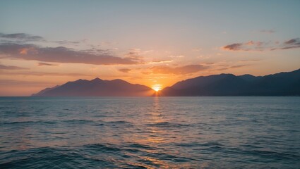 Poster - Serene Ocean Sunset Over Majestic Mountains With Tranquil Waters And Ample Space For Text Adaptation