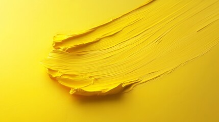 Poster - A vibrant yellow paint smear on a matching yellow background, showcasing texture and dynamic brush strokes. Artistic expression and color concept