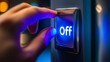 © kura - A hand is pressing the button indicating it will shut off