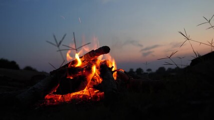 Aufkleber - Campfire burning in the river at sunset