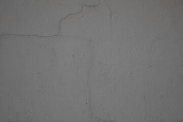 background grey old grunge dirty textured cement wall surface with uneven stains gray and tiny holes