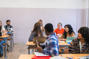 Wall Mural - High school students interacting during class at university or college