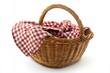 © itchaznong - Top view of checkered picnic basket with food a culinary concept in nature's setting