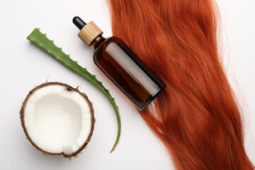 Wall Mural - Cosmetic product, hair lock, coconut and aloe leaf on white background, flat lay