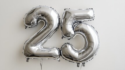 Wall Mural - Silver number 25 balloons against white background for a 25th birthday celebration