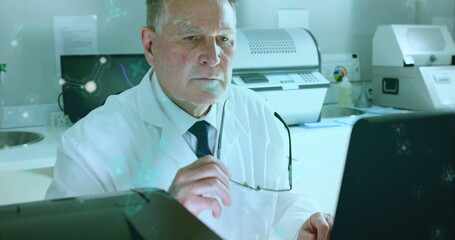Poster - Image of data processing over caucasian male scientist in laboratory