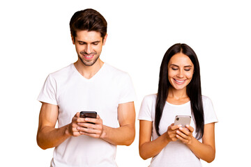Aufkleber - Photo of two people don't mind each other look telephones checking instagram followers wear casual clothes isolated yellow color background