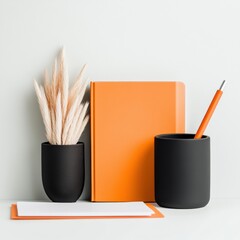 Fototapete - Contemporary Minimalist Workspace Matte Black Desk Accessories with Orange Accents - Stylish Stationery for Creative Professionals and Modern Office Branding
