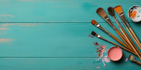 Poster - Boho-Chic Artist Workspace Vibrant Brushes and Watercolor Palettes on Turquoise Wooden Table Inspiring Creative Content for Artistic Brand Storytelling and Visual Merchandising