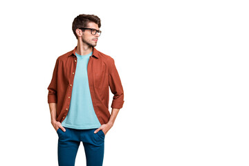 Fototapete - Portrait of his he nice attractive calm successful content brown-haired guy looking aside holding hands in pockets isolated over beige color pastel background