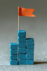 Poster - blue bars chart with orange flag representing growth in data.