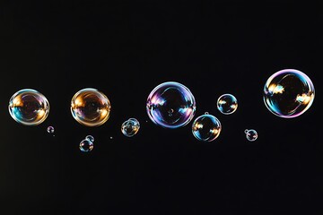 Aufkleber - Iridescent soap bubbles floating on black background. (4)