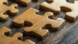© Tuachan - Wooden Puzzle Pieces on Rustic Background for Problem Solving