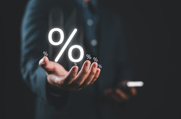Aufkleber - Businessman holding percentage symbol for financial banking increase interest rate or mortgage investment dividend from business growth concept. Economic recession. Interest rate burden.