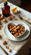 © methinee - Walnut halves scattered on a linen tablecloth with a heart-shaped plate as the centerpiece, heart shape, warm lighting, rustic charm