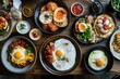 © Thanapong - Delicious egg dishes from around the world a stunning overhead view of culinary art on a wooden table inviting food lovers to experience global flavors