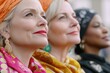 © Fotograf - A group of women wearing colorful headscarves and scarves for celebration or cultural event
