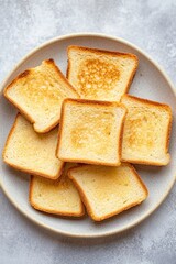 Poster - Freshly baked toast served on a clean white plate, perfect for breakfast or snack