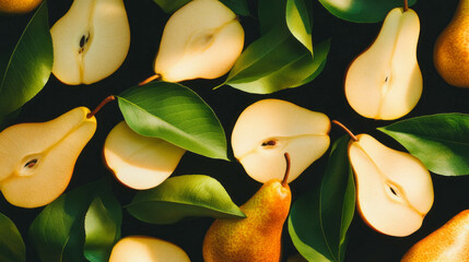 Poster - Sliced pears with green leaves on dark background for food design and decor