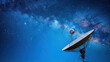 © Katerina Bond - Large satellite dish pointing toward a starry night sky, representing space exploration, communication technology and astronomy research.