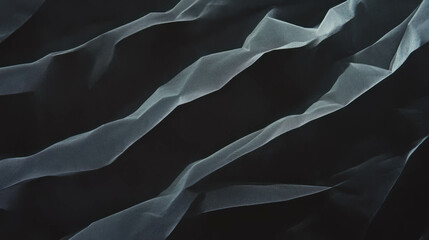 Poster - Abstract texture of lightly rumpled black paper for creative design projects