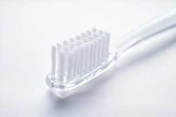 Poster - Close-up shot of a toothbrush sitting on a clean white surface