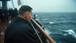 © Maximages  - A contemplative sailor leans over the railing, surrounded by foggy waters, invoking feelings of introspection, solitude, and the mystery of the sea during challenging weather.