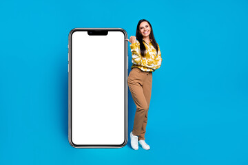 Poster - Photo of glamour lovely elegant woman wear trendy clothes presenting web site empty space isolated on blue color background