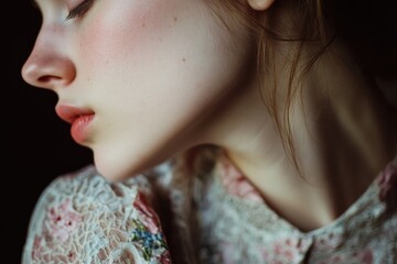 Wall Mural - A close-up shot of a woman's face with her eyes closed, ready to relax or meditate