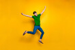 © deagreez - Full length body size photo of cheerful positive attrative man in blue pants trousers leather shoes flying jumping running up to his dream isolated over vivid color background