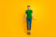 © deagreez - Full length body size view of his he nice attractive funny playful childish guy jumping up isolated over bright vivid shine vibrant yellow color background