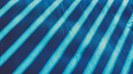 Poster - Deep diagonal ribbed blue paper texture for artistic background and design