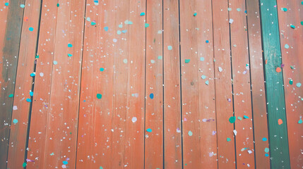Poster - Festive wooden surface with colorful confetti perfect for party celebrations
