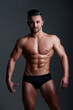 © Volodymyr - Fit man with muscular six pack abs and strong body. Seductive male model with strong power muscles. Attractive topless guy. Young sexy man with muscular body. Sexy male model.