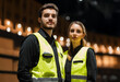© Martlaw - A pair of security guards in front of a dark background