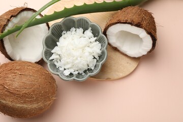 Wall Mural - Hair treatment. Coconut, butter shavings and aloe leaves on beige background, flat lay