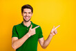 © deagreez - Photo of cheerful cute nice attractive handsome man pointing at empty space to be fulfilled with his forefingers smiling toothily with bristle on face beaming isolated over bright color background