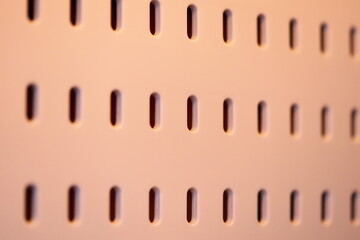 Poster - A close-up shot of a wall with holes in it.