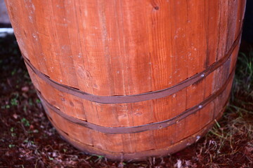 Poster - A single wooden barrel sits atop a green field.