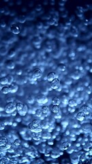 Aufkleber - Super Slow Motion of Bubbling Blue Water in Detail. Extreme Macro Shot, Abstract Texture. Filmed on High Speed Cinema Camera, 1000 fps. Vertical Aspect Ratio.